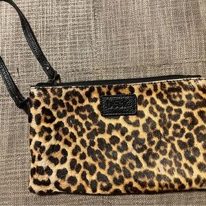 BECK wrostlet leopard print has some wear in the corner